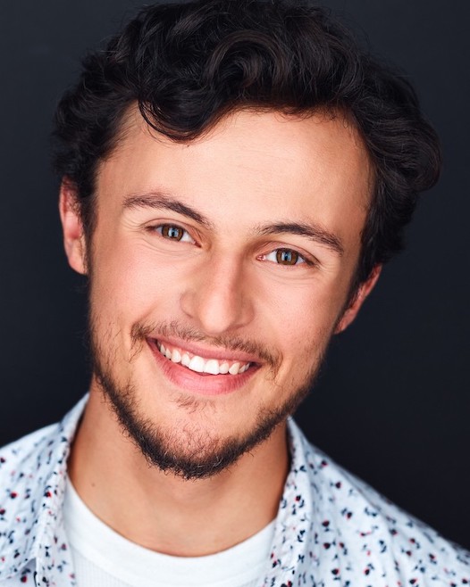 Headshot of Zachary Speigel.